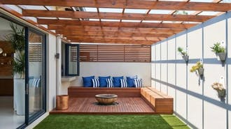 Enclosed pergola, small backyard with wooden patio and bench