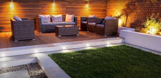 Enclosed wooden patio with outdoor furniture